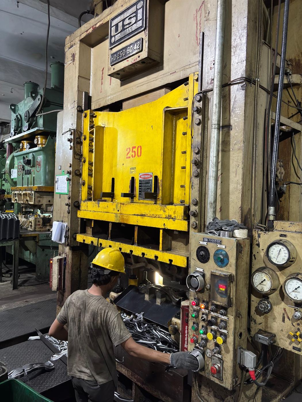 Engineer reviewing precision manufacturing work